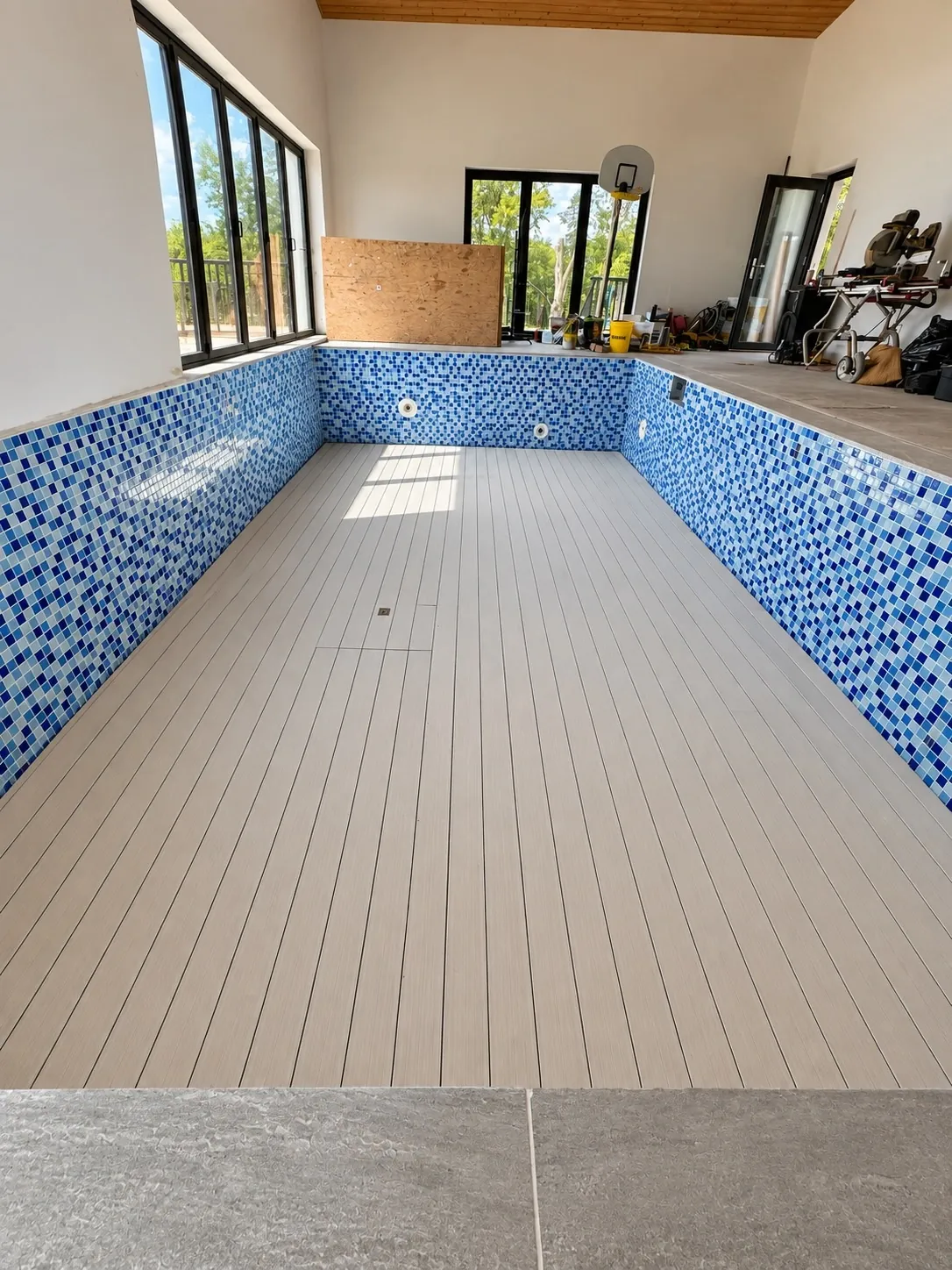 Finished WaveLift composite floor raised in a Cambridge indoor pool
